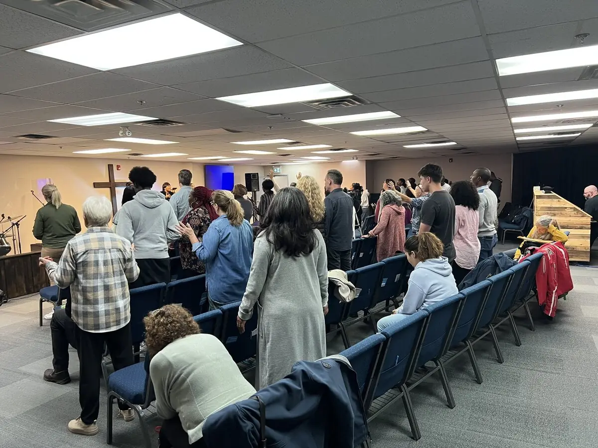Contact Calgary Bible Training Centres: students gathered for Bible study in the Alberta Bible College Chapel